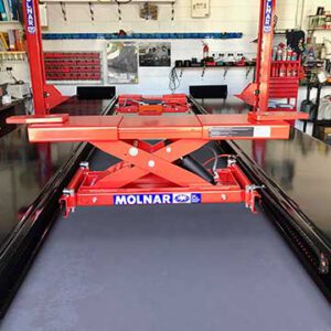 Micro 2000 jacking beam positioned under vehicle