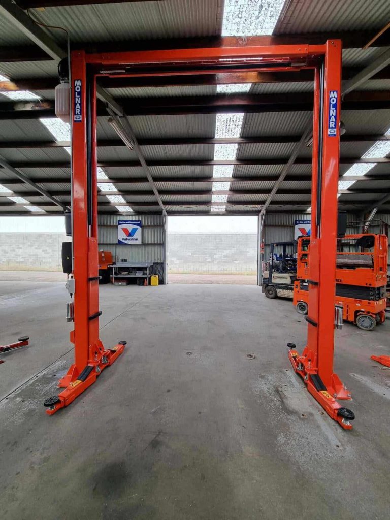 CM245-A 2 post hoist installed in service bay