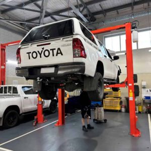 CM255-A 2 post hoist in busy workshop environment